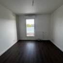 APPARTEMENT AVEC BALCON ET STATIONNEMENT