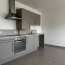 APPARTEMENT AVEC BALCON ET STATIONNEMENT
