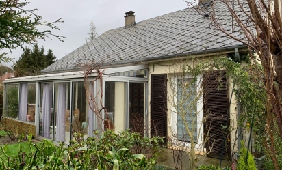 MAISON DE PLAIN-PIED AVEC GARAGE ET JARDIN 